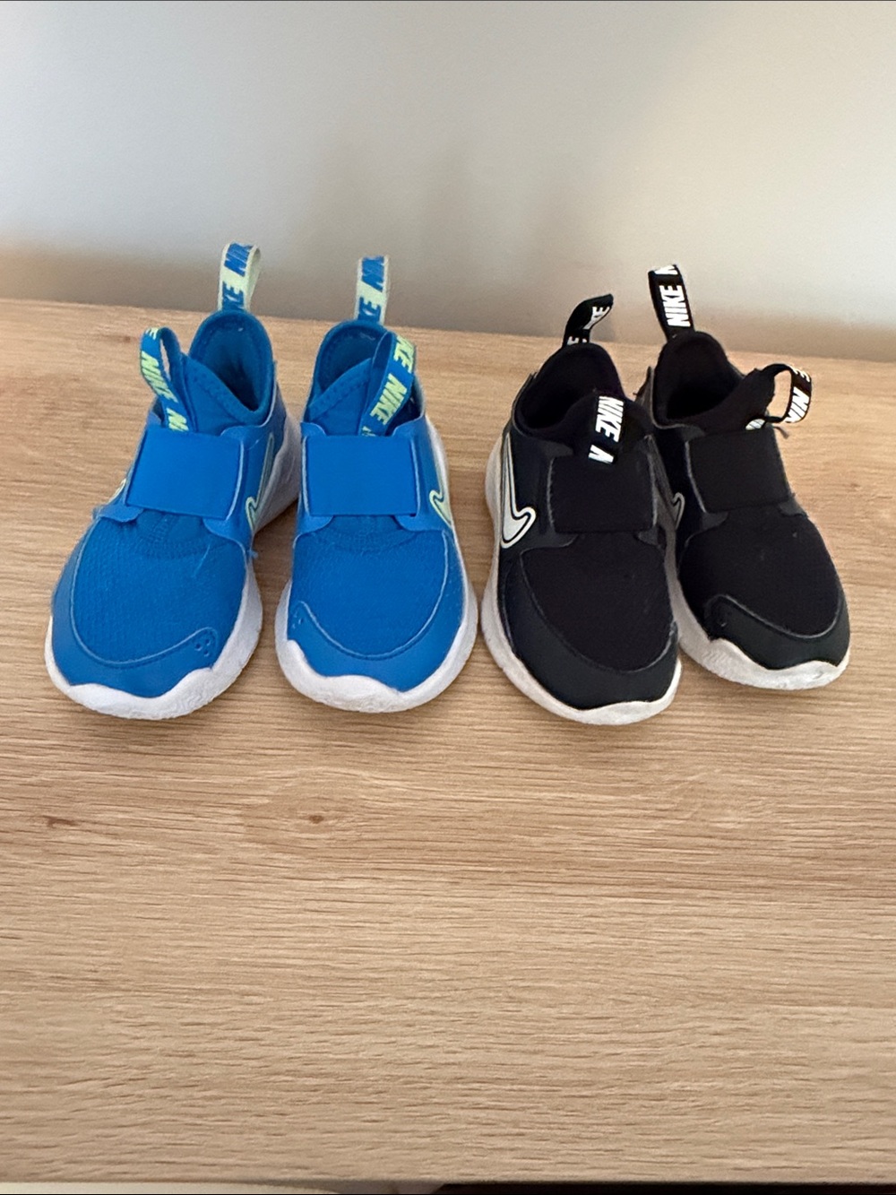 Toddler size 8 Nike Kids Slip-On Sneakers in Blue and Black